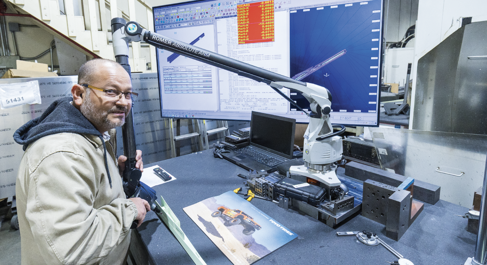 Not many shops of this size have a Romer Arm, and Leo is quite proud of his latest addition. Eleazar Hernández is utilizing the touch probe to inspect an aerospace part. The arm is so new that they were getting training on it the day CNC West Magazine was onsite.